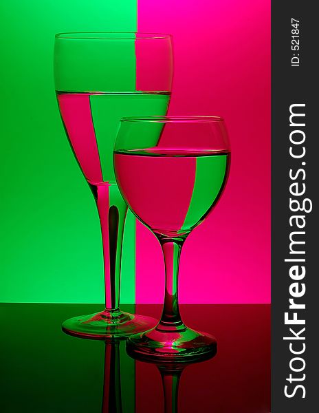 Two glasses on neon background - see portfolio for more views