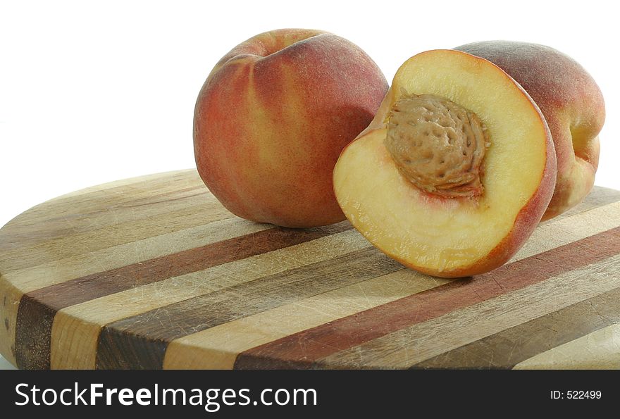 Two whole peaches and one half peach