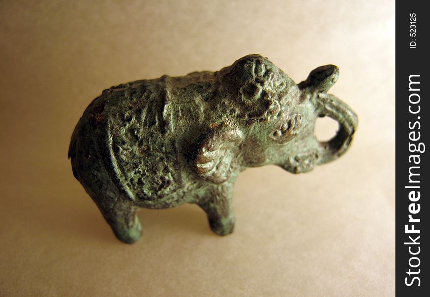 Original image of a copper elephant knick-knack.