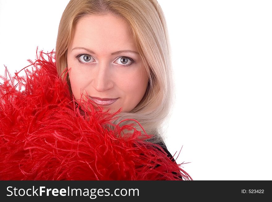 Pretty girl in red feathers over white background