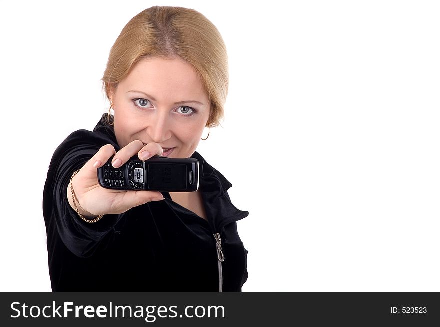 Attractive business woman showing her cellphone with focus on the phone. Attractive business woman showing her cellphone with focus on the phone