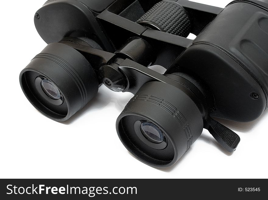 Black binoculars isolated on white. Black binoculars isolated on white.