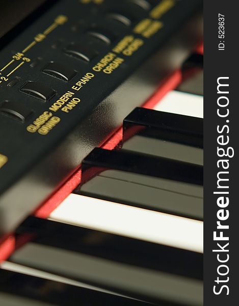 Electro piano keyboard with red stripe. Electro piano keyboard with red stripe