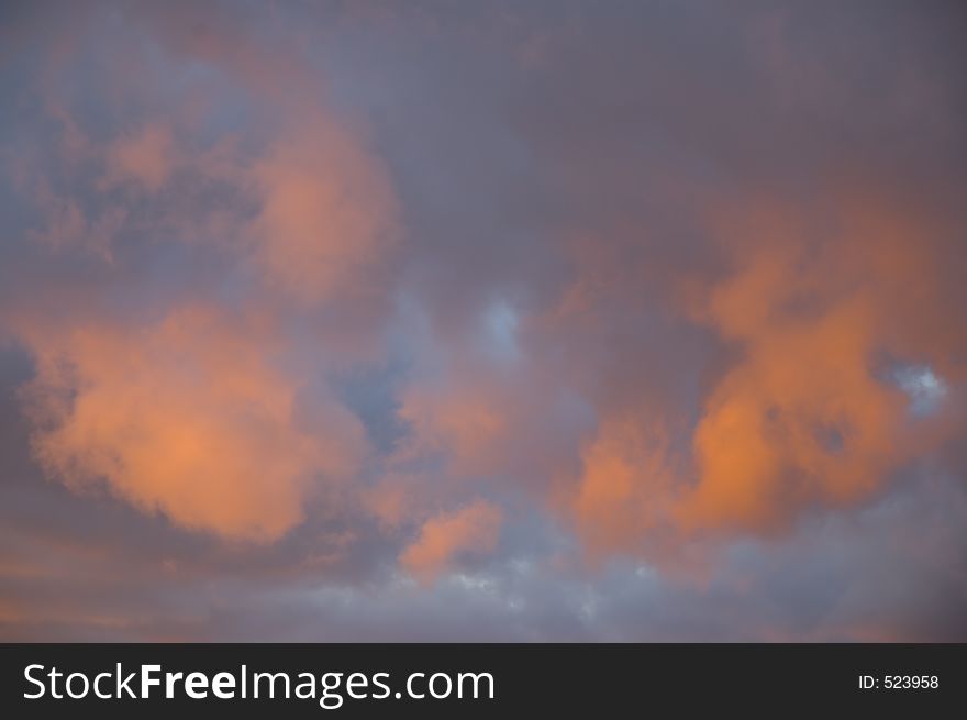 The sky turns orange as a thunderstorm moves in at sunset at Smoky Mountain National Park in Tennessee. The sky turns orange as a thunderstorm moves in at sunset at Smoky Mountain National Park in Tennessee