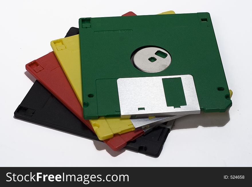 Stacked colored diskettes.