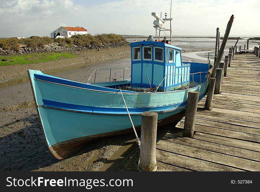 Typical fishing boat in Sado Estuary Natural Reserve doc - Setúbal district - Portugal