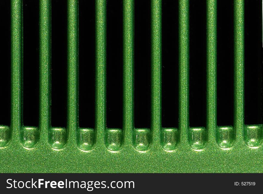 A closeup of a green mod comb