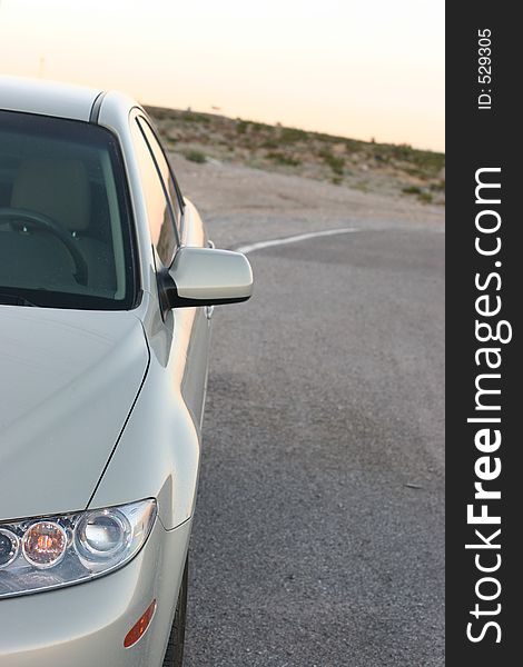 Car is left abandoned in the desert. Car is left abandoned in the desert.