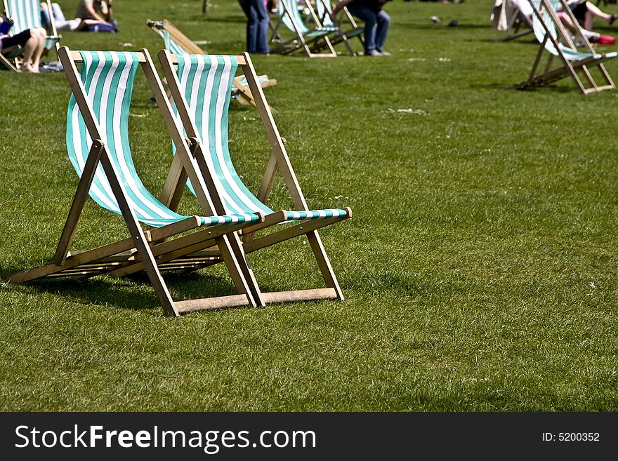 Empty deck chairs at Hyde London Park. Empty deck chairs at Hyde London Park