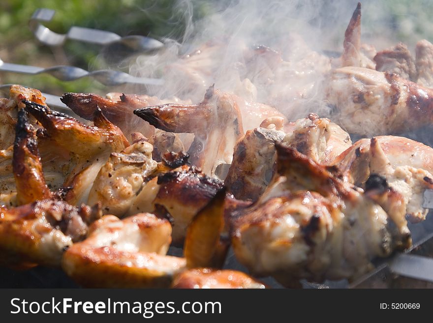 Close up chicken shashlik on a skewers. Close up chicken shashlik on a skewers