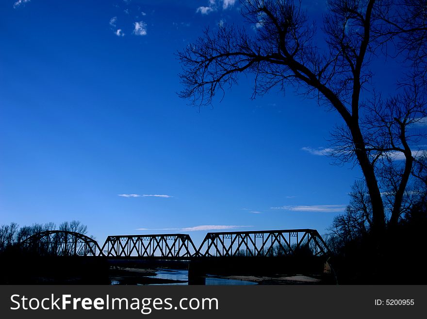 Photo of old steel railroad bridge taken in Oklahoma. Photo of old steel railroad bridge taken in Oklahoma