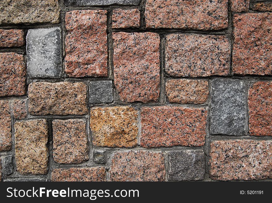 Stone wall of different granites