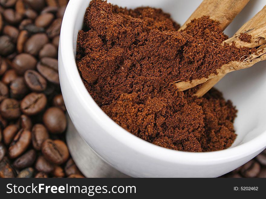 Cup, coffee and cinnamon stick