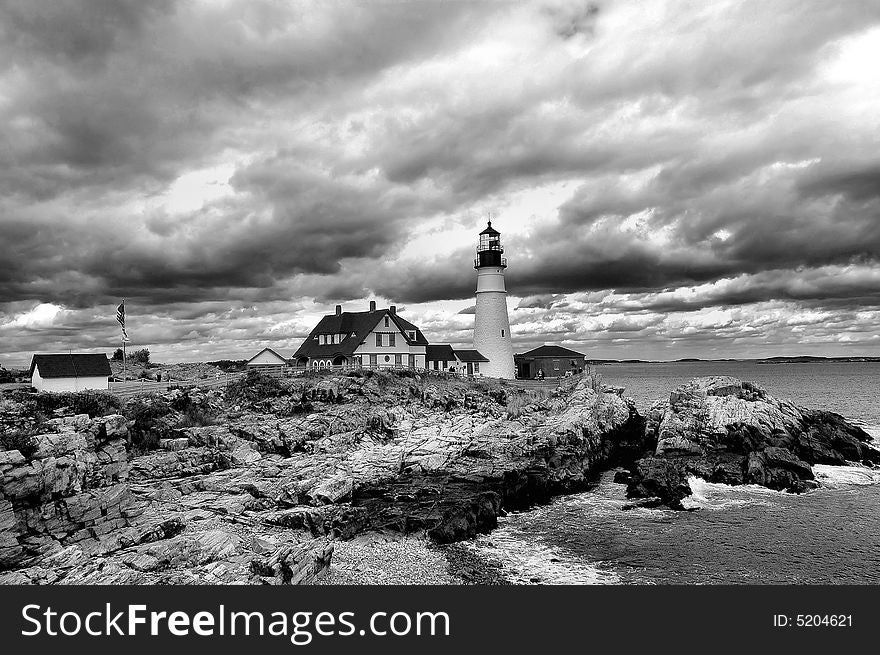 A stormy day at a Maine lighthouse in the spring. A stormy day at a Maine lighthouse in the spring.