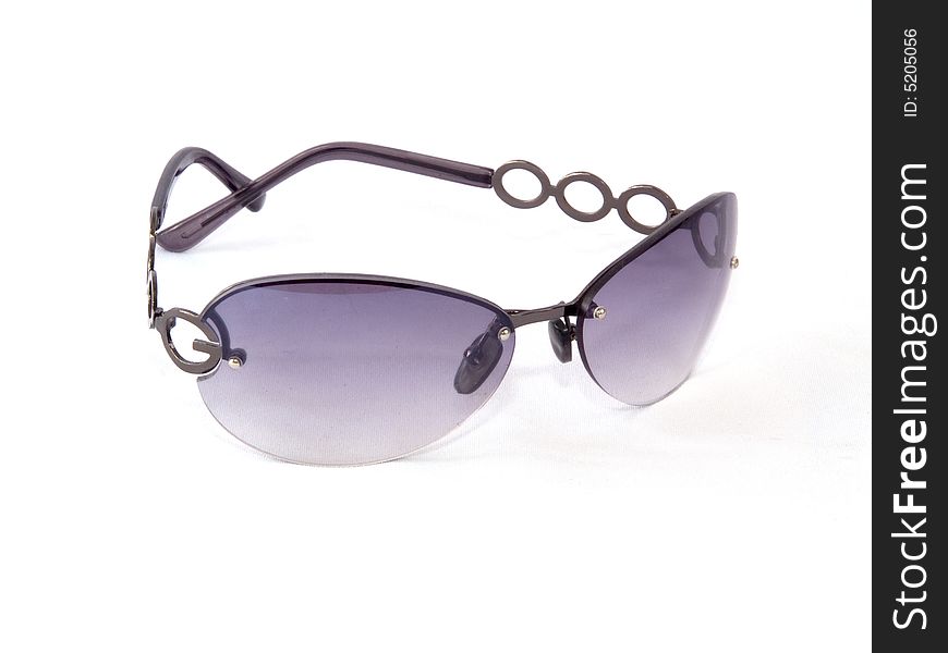 Violet fashion sunglasses on white background.