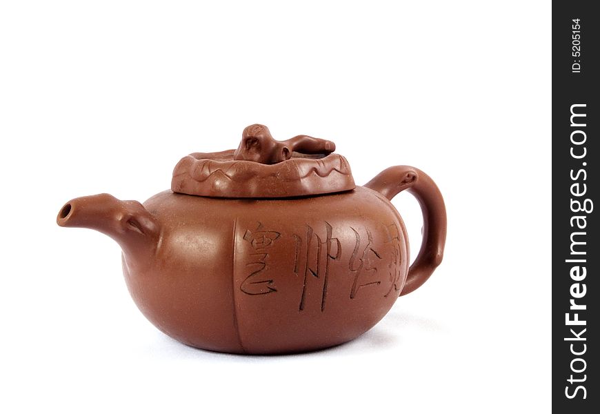 Chinese ceramic teapot decorating hieroglyphs on white background