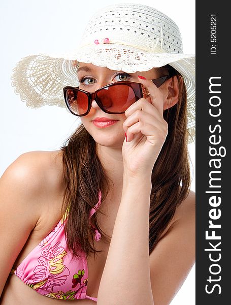 Woman in sunglasses in hat