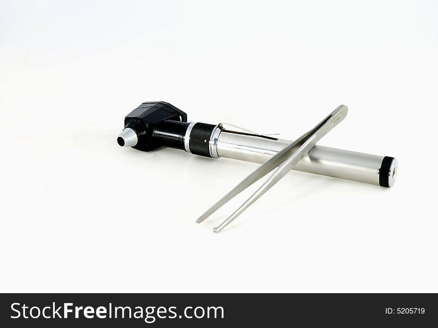 Isolated metal Otoscope on a white background. Isolated metal Otoscope on a white background