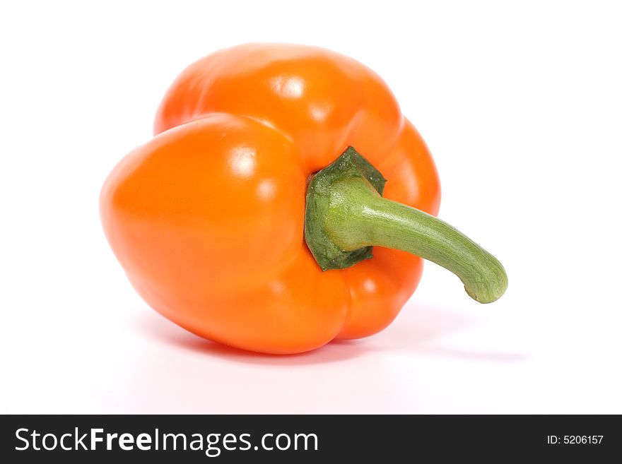 Orange sweet pepper isolated on white