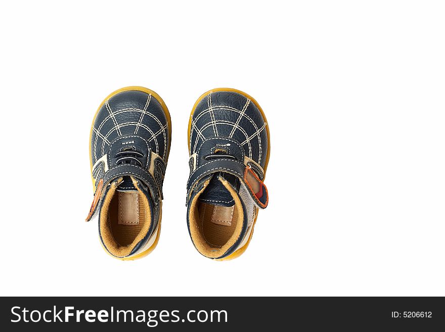 Small shoes over white background