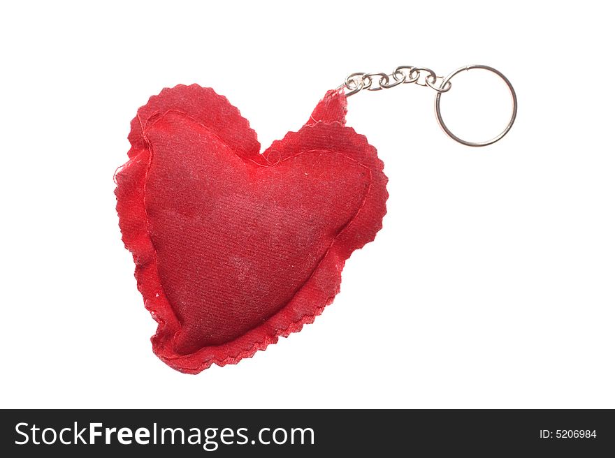 Used chained heart over white background