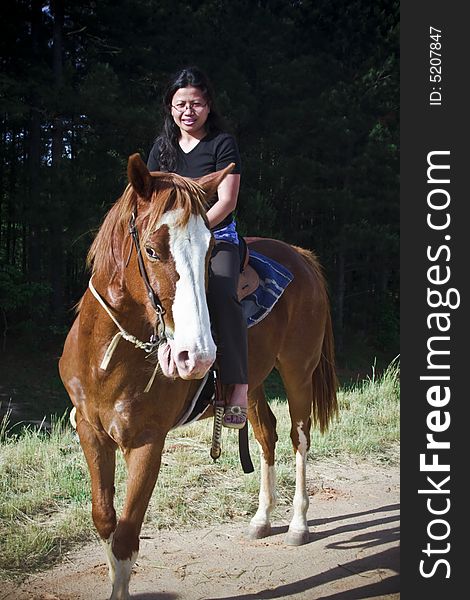 Girl Riding Horse