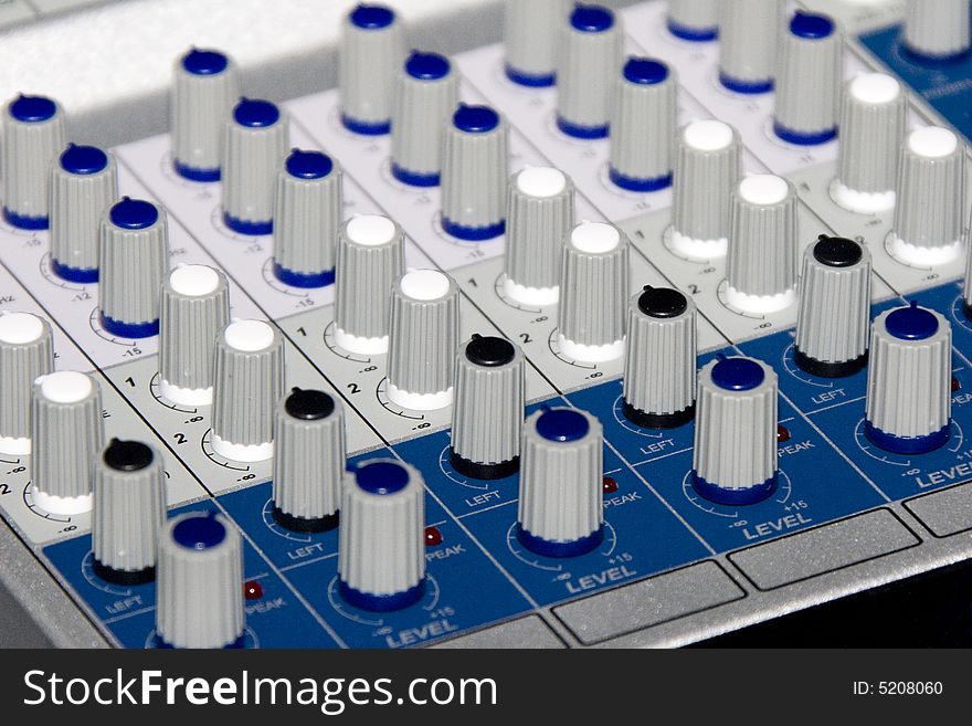 Fader of a mixer with black background