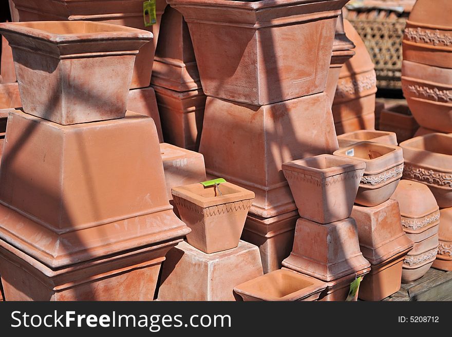 Stacks of flower pots; outdoor, day. Stacks of flower pots; outdoor, day