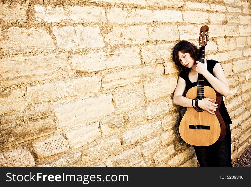 Street Artist Holding Guitar