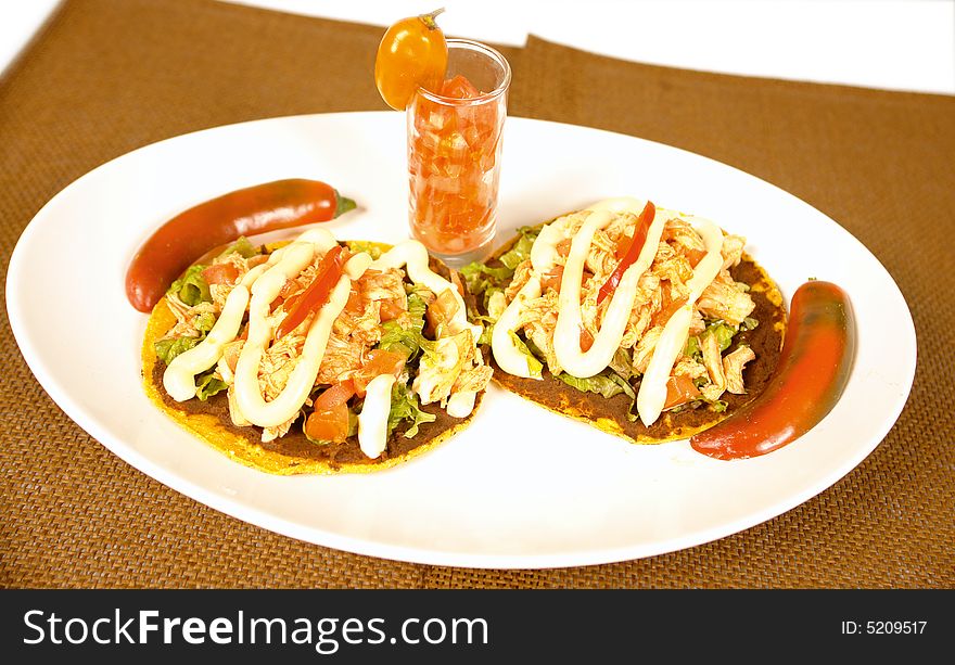 Open chicken breast tacos with tomato sauce. Open chicken breast tacos with tomato sauce