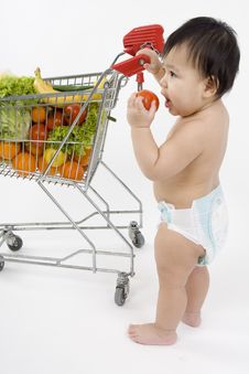 Baby Pushes A Shopping Cart Royalty Free Stock Photos Baby Pushes A Shopping Cart Royalty Free Stock Photos