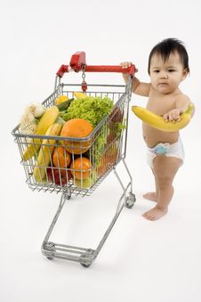 Baby Pushes A Shopping Cart Royalty Free Stock Photos Baby Pushes A Shopping Cart Royalty Free Stock Photos