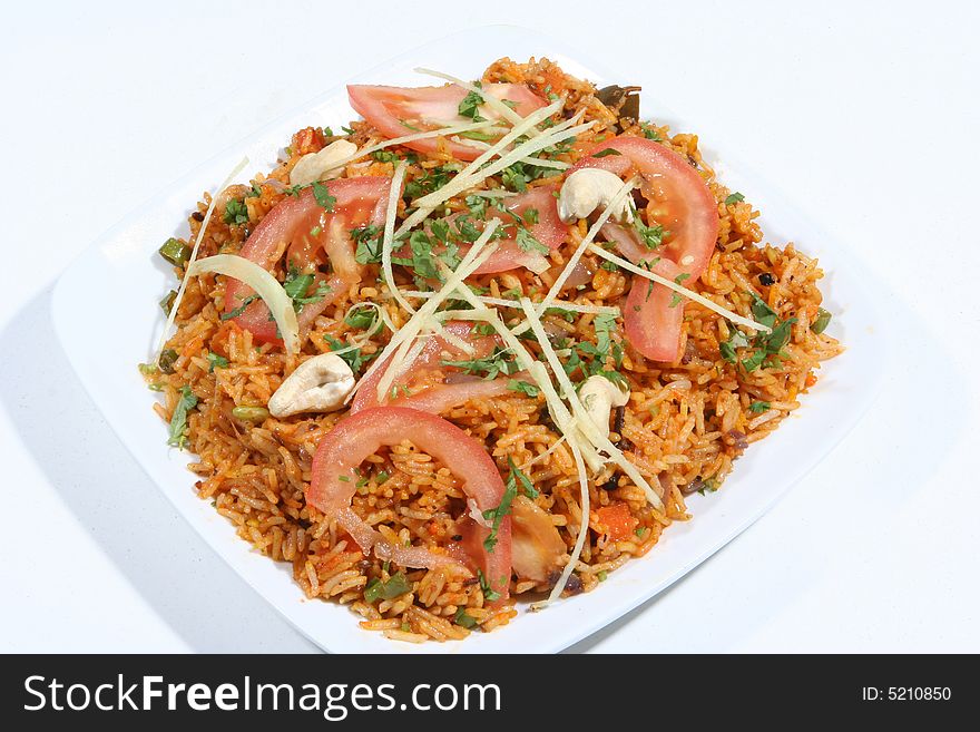 indo chinese style rice in a square plate with sauces. indo chinese style rice in a square plate with sauces