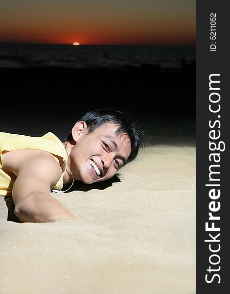 Man having fun on tropical beach sand outdoor. Man having fun on tropical beach sand outdoor