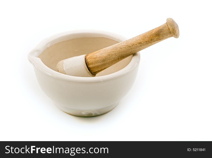 Ceramic mortar and pestle isolated on white