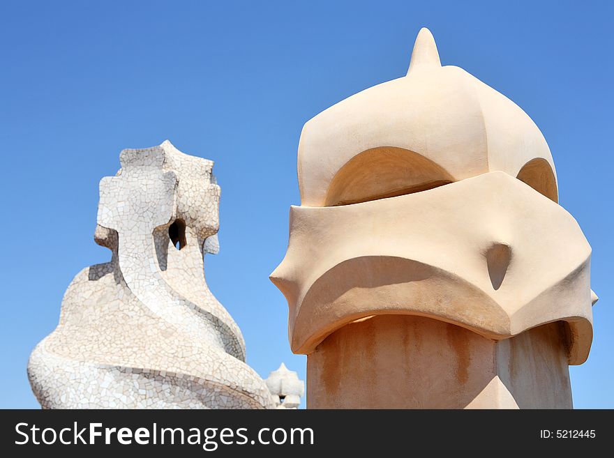 Abstract sculptures on the roof La Pedrera (Milà House) in Barcelona, Spain created by Antonio Gaudi. These sculptures are the chimneys of the apartment building