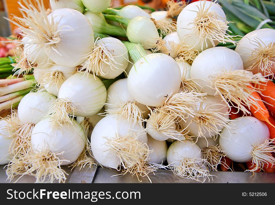 Spicy fresh spring onions at the vegetable market