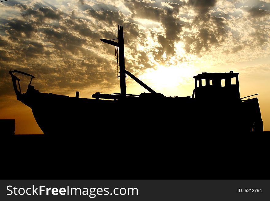 Beautiful sunset and fishing boat