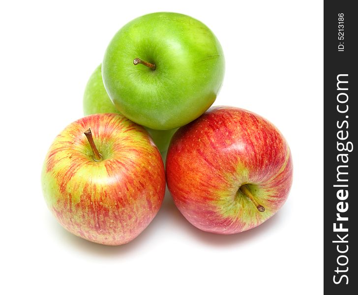 The ripe juicy apples on white. Isolation, shallow DOF.