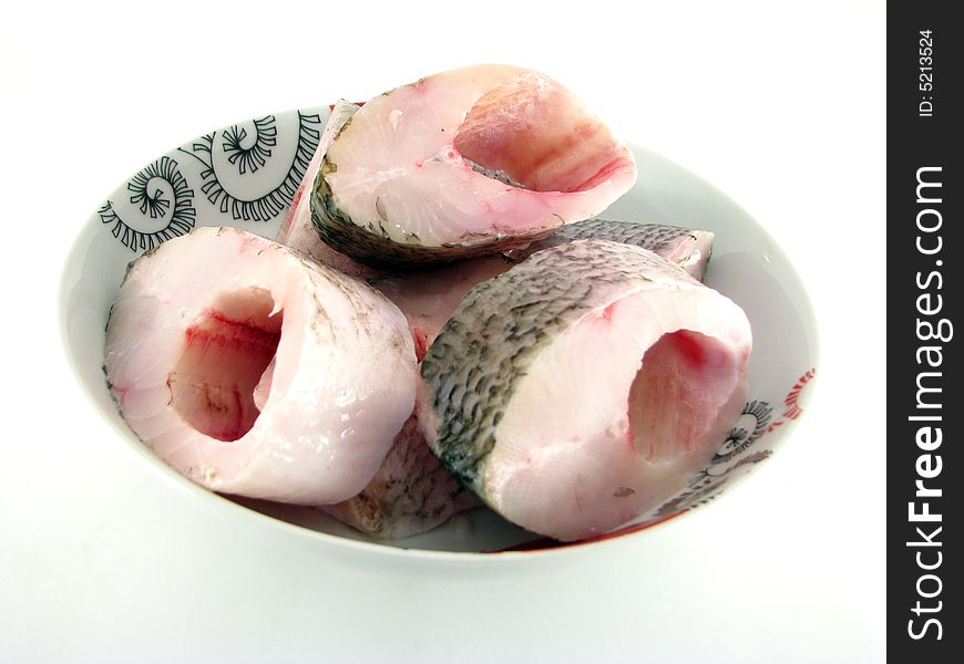 Fillet of a fresh fish in a plate