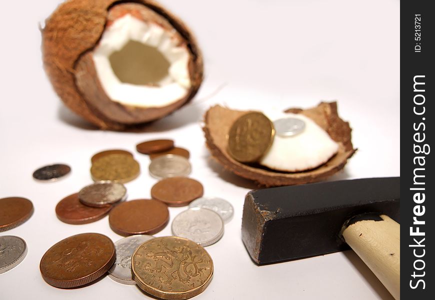 Unexpected a surprise a treasure in a coco which have broken a hammer and have found out there coins. Unexpected a surprise a treasure in a coco which have broken a hammer and have found out there coins