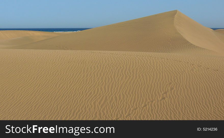 Sand dunes in the desert.At the Gran Canary's island. Sand dunes in the desert.At the Gran Canary's island