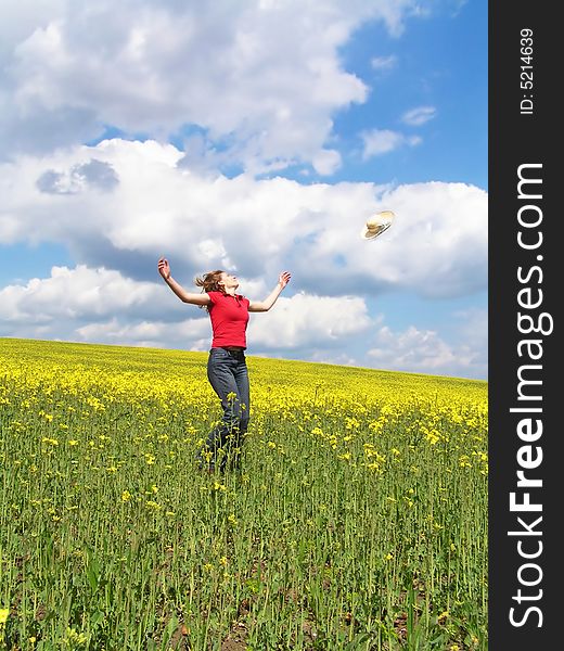 Young girl jumping in field. Young girl jumping in field