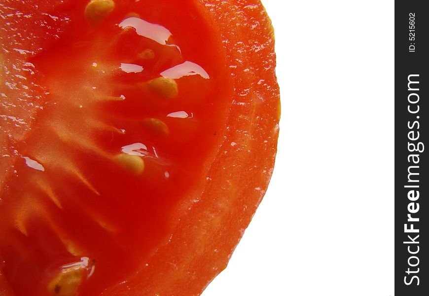 Half of tomato's lobule in the white background. Half of tomato's lobule in the white background