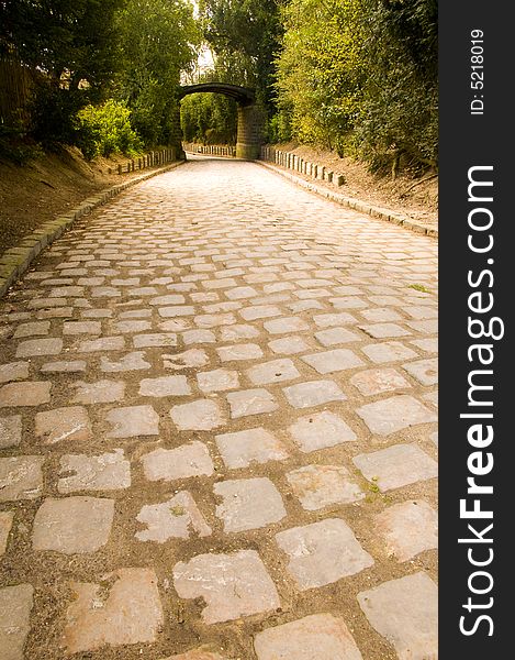 Road with pictoresque bridge, France