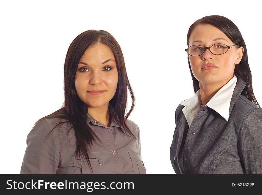 Two attractive businesswomen on white background. Two attractive businesswomen on white background