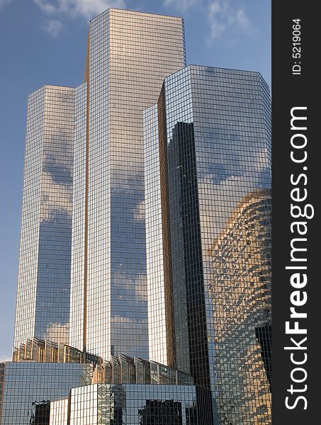 Skyscrapers and office towers with the  blue sky, La Defense, Paris. Skyscrapers and office towers with the  blue sky, La Defense, Paris