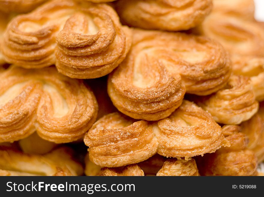 Close-up of fresh baked heart-shaped sugar buns