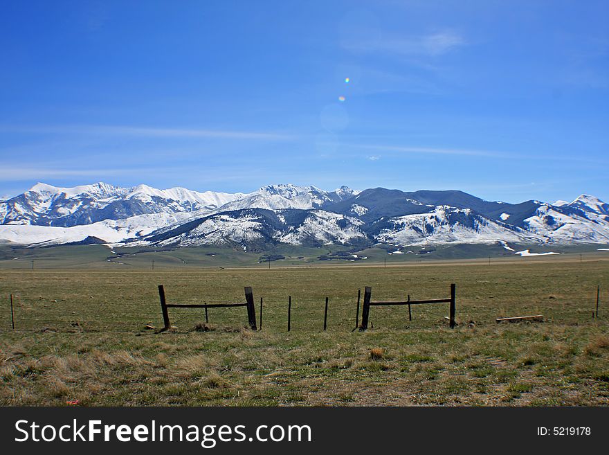 Lanscape view of fields and a mountain range in montana. Lanscape view of fields and a mountain range in montana