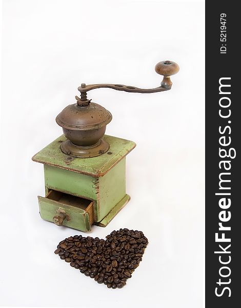 Old Coffee Grinder With Coffee Beans